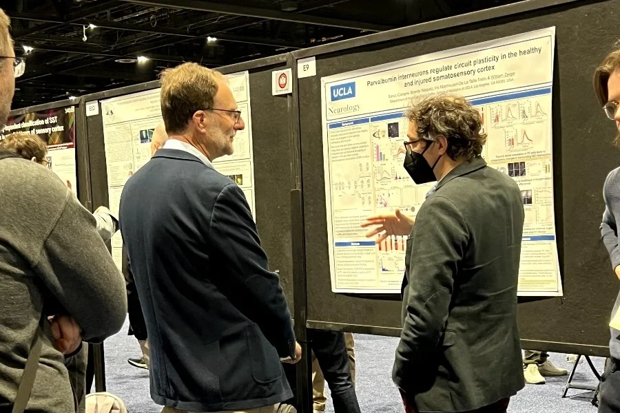 Dr. Zeiger presenting a research poster at SFN 2024