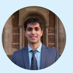 Aayush Verma standing in front of a building on UCLA's campus