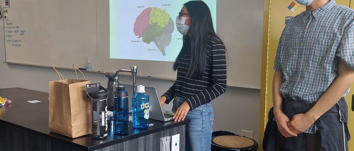 Members of the Zeiger Lab give a presentation on careers in neuroscience at East College Prep.